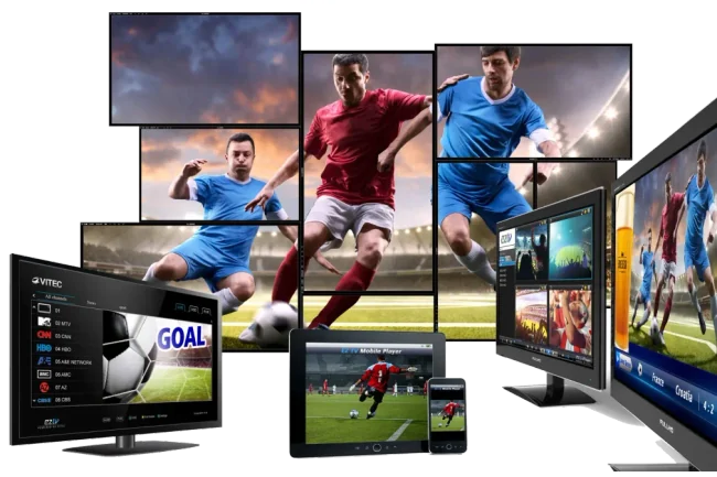 A wall of screens and mobile devices all carrying the same live football match.